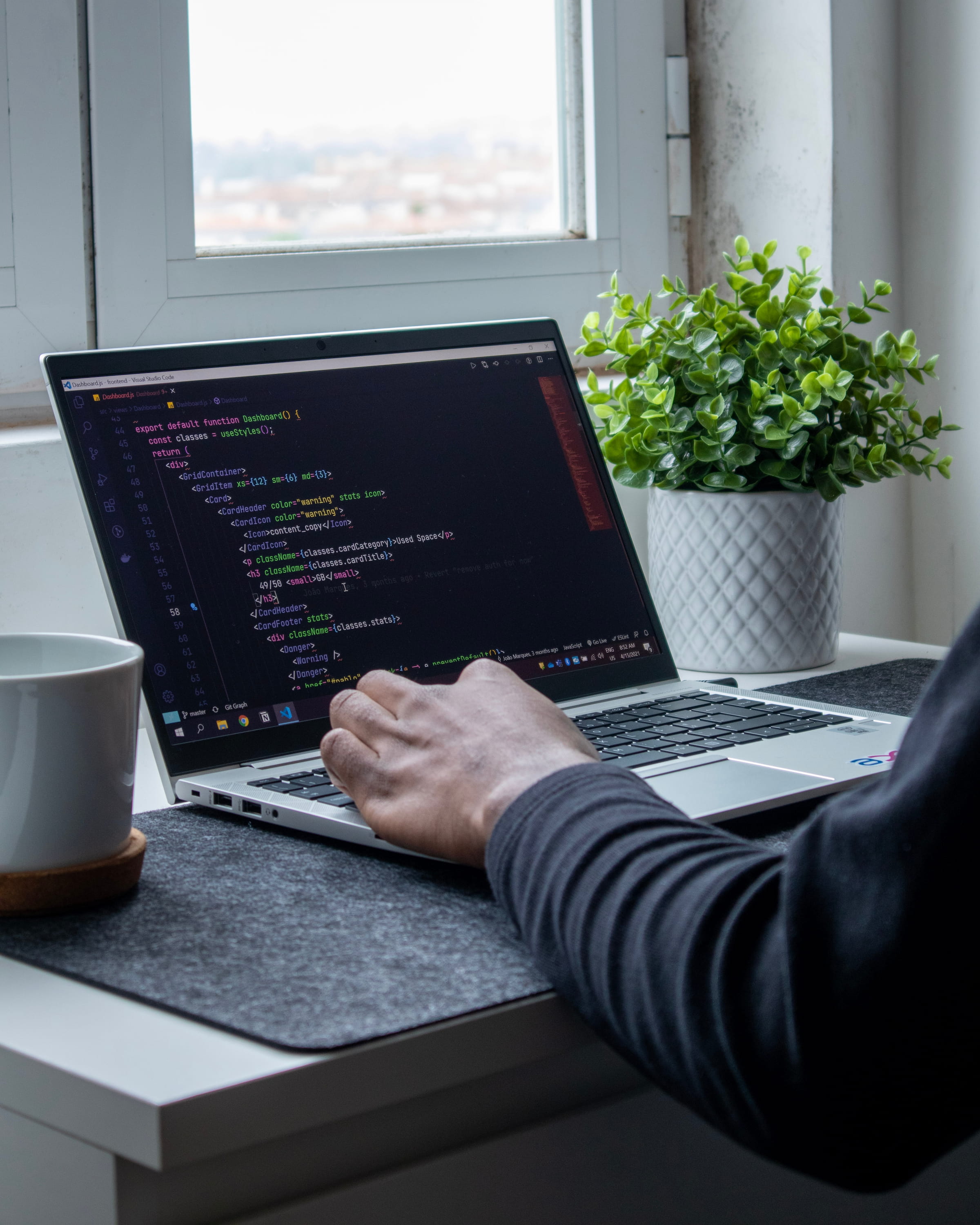 Modern web development workspace showing responsive design and clean code